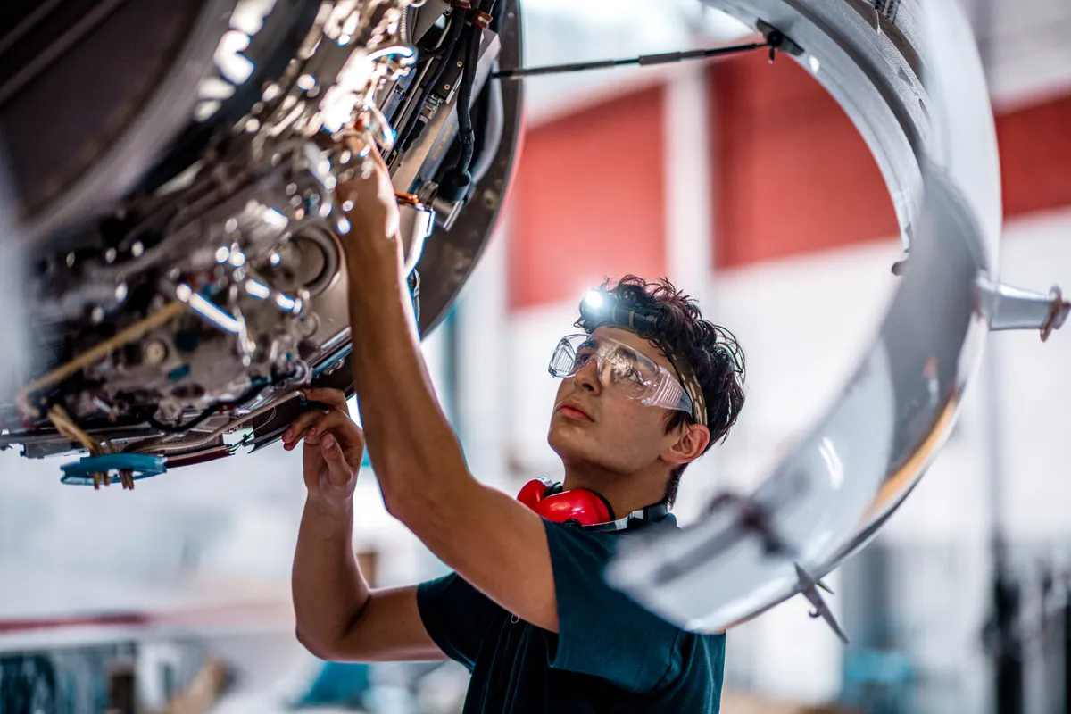 Technician reviewing equipment